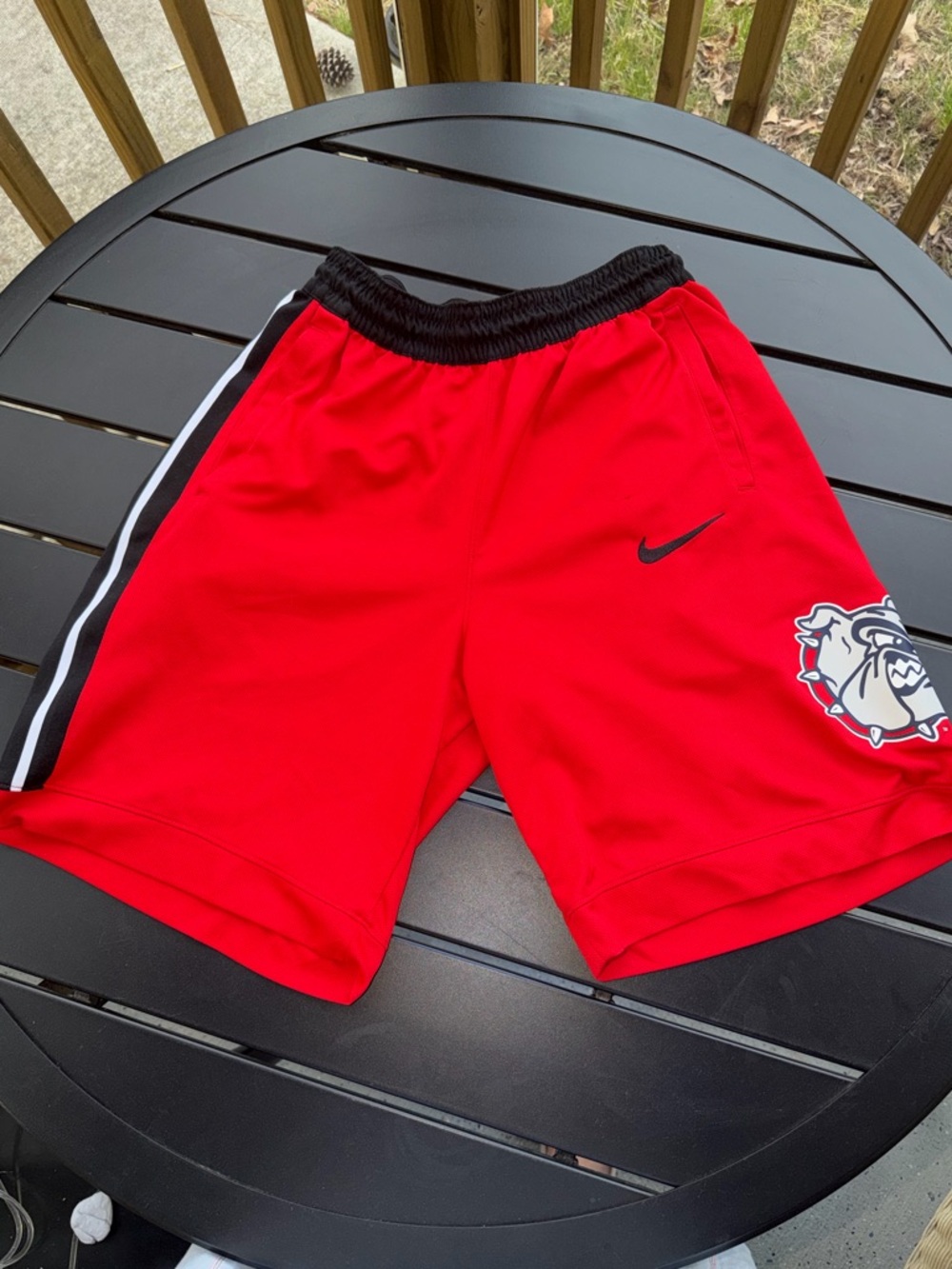 Nike Dri-Fit Georgia Bulldogs basketball shorts in red.